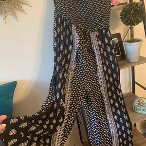 Adorable one piece jumpsuit. Tags on. Never worn.